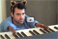 חתול_מנגן